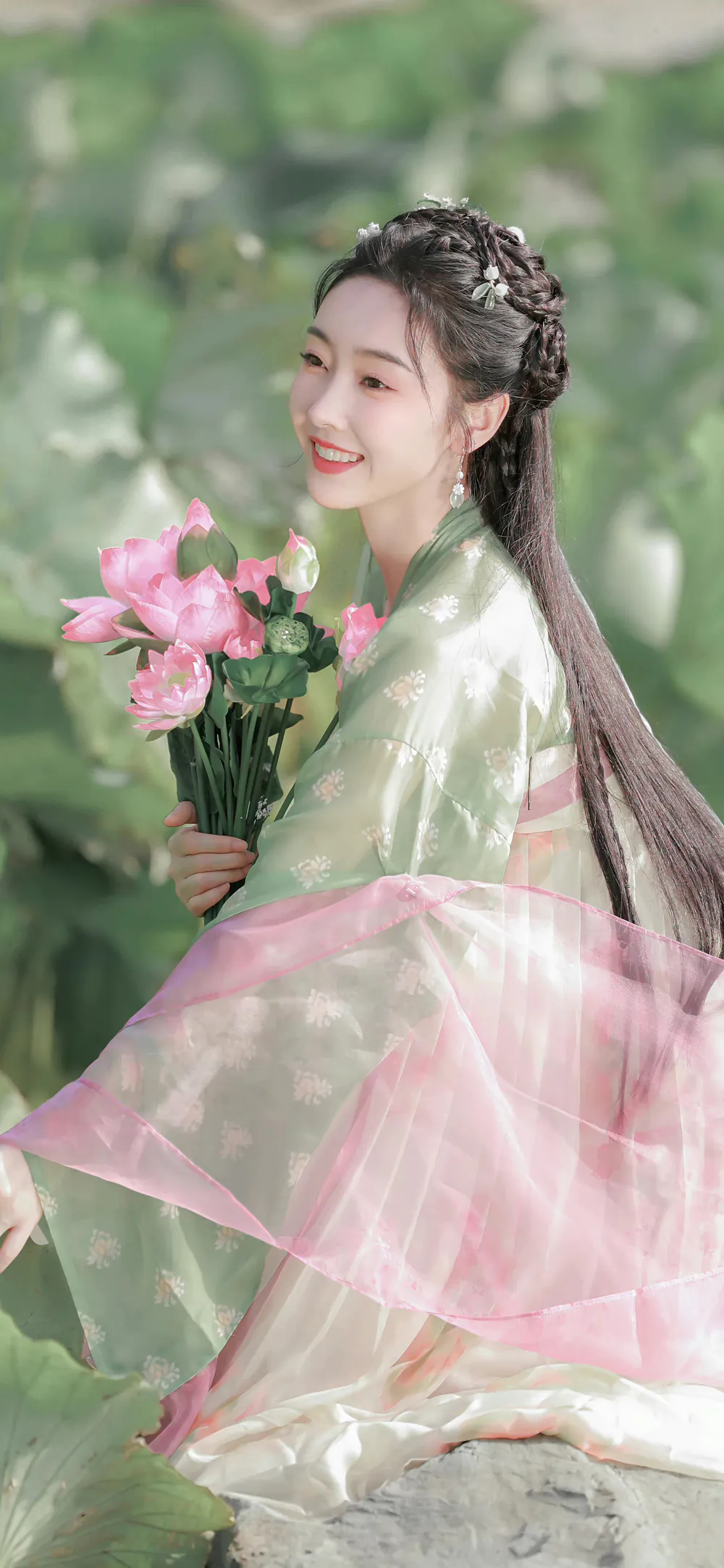 Graceful Girl in Traditional Hanfu Dress with Lotus Flowers Bouquet