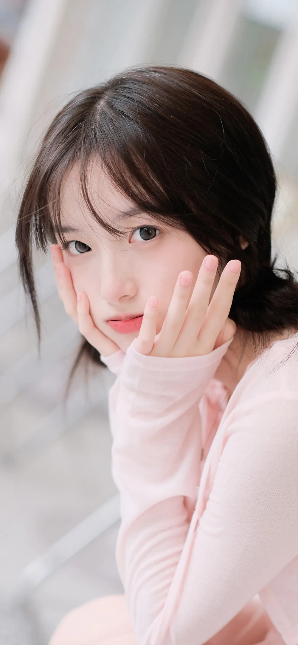 Sweet Sunshine Girl in Soft Pink Sweater Gentle Expression Wallpaper